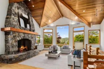 Keep your jaw together because this is truly amazing! Imagine sitting here every day enjoying a piece of NW architecture with 18ft ceilings and an extra large space to lounge in with a view.
