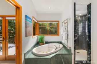 Soak in your tub overlooking your garden space in privacy and great light!