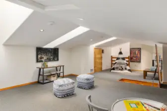 Bonus attic space that's very usable, has skylights, A/C, and over 6ft of headspace to walk around. Accessable from a walkup ladder from your hallway.