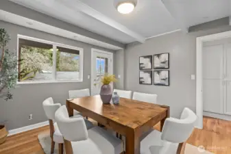 Exposed beam ceilings in the dining room.