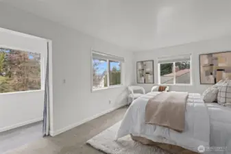 Primary suite with sunroom and private deck.