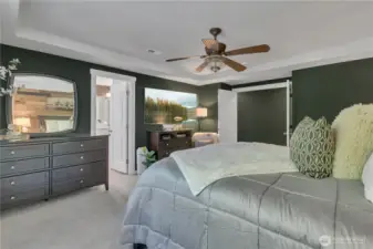 French doors lead to grand primary suite