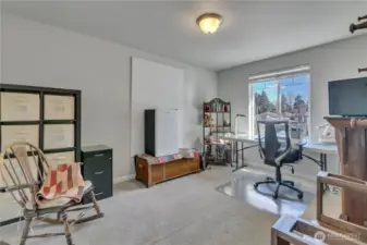 Two of three additional bedrooms upstairs