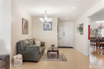 Facing the front door, sitting area and kitchen, dining to the right