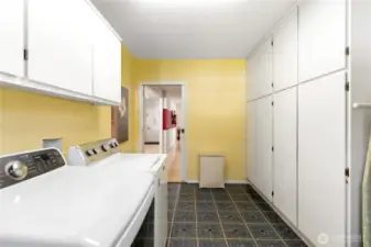 Laundry room with tons of storage, facing out towards the kitchen