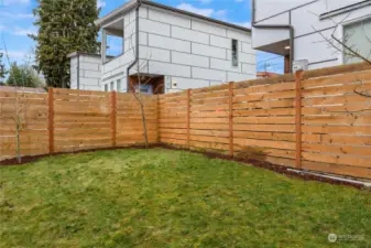 A fully fenced yard and ample grassy area are perfect for pups and play. The amazing southern exposure will inspire the gardener in you to take advantage of the abundant light.