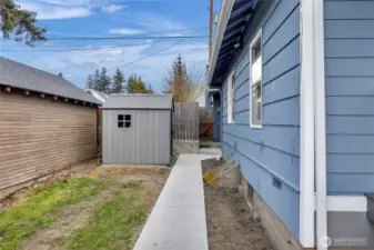 Side entrance that leads to back parking pad