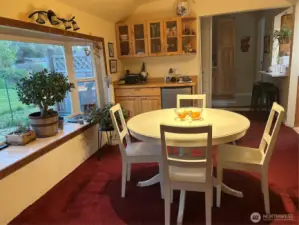 dinning room with with bar and small bar fridge