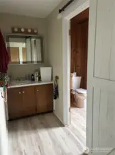 More new flooring.aster bath entrance