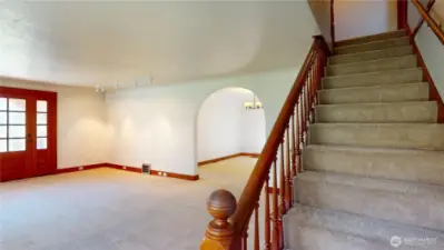 Base of stairs looking towards the living room & dining room