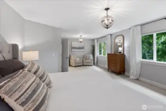 Lined with windows and black out window treatments. Double french door and room fora sitting area / work out equipment / bassinet. Lots of options for the space.
