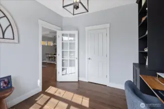 A look back at the closet and door on the main level bedroom. Add window treatment for quick privacy on the door.