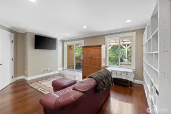 What a nice sized Bonus Room that you can do so much with! An expansive slate tiled deck through the doors outside! Movie room, game room, you name it!  Direct access to a half bath!