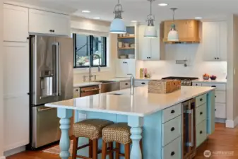 ...island veggie prep sink, propane stove with water spigot, deep country sink...
