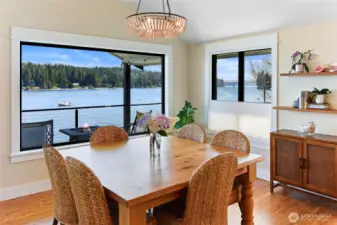 Dining room, killer view, honeycomb dual rise and drop shades.