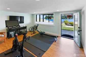 The rec room makes a great workout room and has access to the ground floor patio under the upper level deck.