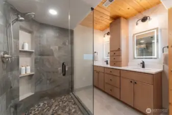 Completely remodeled primary bathroom with walk-in shower & dual vanity