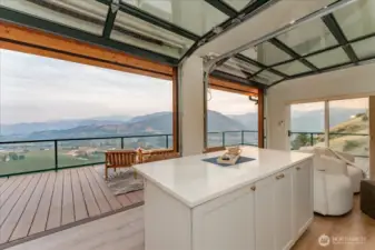 Roll-up garage doors in ADU to soak in the view