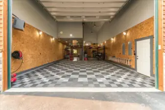 Impressive detached shop with car lift