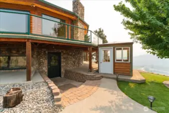Lower level entrance with enclosed hot tub room