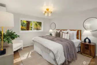 The very large primary bedroom accommodates a king sized bed