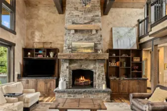 Floor to ceiling stone fireplace
