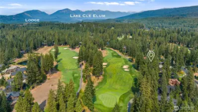 Aerial view of neighborhood and golf course
