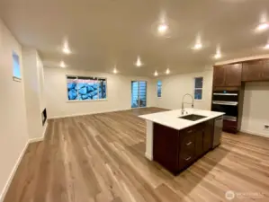 Open layout kitchen great room and fireplace