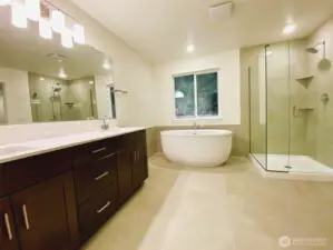 Primary bathroom with deluxe free-standing bathtub