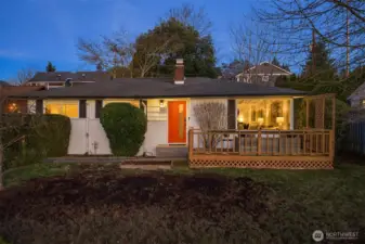 A classic 1958 rambler with rare curb appeal and a welcoming presence.