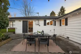 Private, L-shaped patio made for summer dinners and evening drinks.