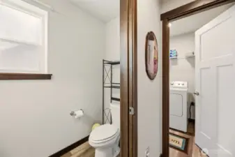 View of lower Bathroom & peak at Laundry Room