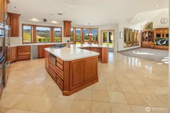 The kitchen, eating space and family room together makeup a fabulous great room! Sweeping views throughout!