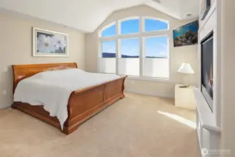 Primary Suite with the option of having a view or privacy while relaxing! Note the gas fireplace.