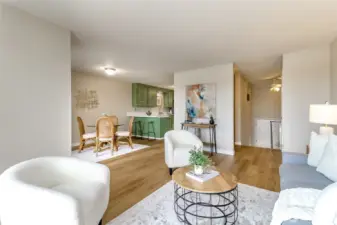 This angle shows the stairs, dining room and kitchen.