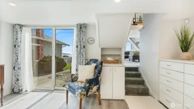 Downstairs bonus room with built-in cabinets would make a great office
