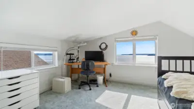 Loft bedroom has a view from both windows