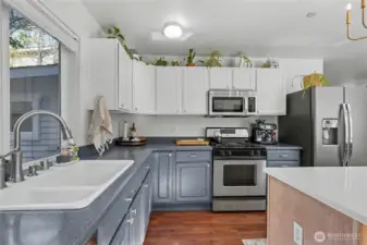 Deep double sink and gas fireplace.