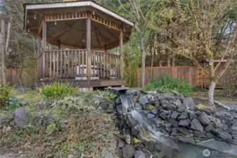 Covered pergola for quiet mornings with your coffee.