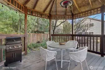 Covered pergola - just bring your string lights and space heater for year round entertaining.  (Virtually staged)