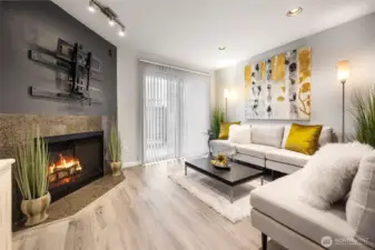 Living room w/ wood fireplace