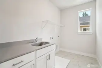 Laundry room -w/qtz, cabinet w/sink