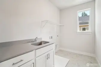 Laundry room -w/qtz, cabinet w/sink