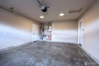 Garage (facing north) shows side door to west