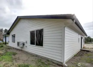 West side exterior, LANDSCAPING UNDER CONSTRUCTION