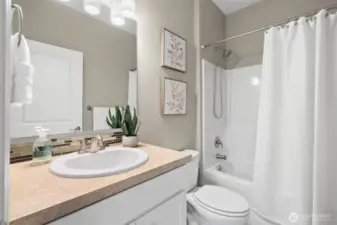 Full bath on 2nd floor is ideal for this bedroom layout on the 2nd floor.  Double sinks in this main bath makes this room easy to share between the two bedrooms on the 2nd floor.
