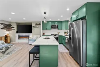 Open concept where the living room, dining room and kitchen all flow seamlessly together!