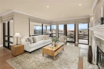 Open-concept living areas are bathed in natural light, seamlessly extending through a wall of windows to an expansive covered patio—perfect for year-round enjoyment.