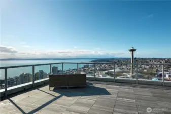Spectacular rooftop views looking to the NW of the north tower with sunset views over the Olympic Mtn range, Sound & Space Needle!
