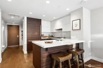 Beautiful kitchen with eating bar for casual meals.